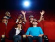 © Nejron Photo - Group of people in 3D glasses watching movie in cinema