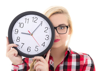 Wall Mural - beautiful teenage girl in eyeglasses holding clock isolated on w