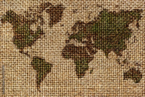 Fototapeta na wymiar World map drawn on a rough,old fabrics.