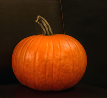 Halloween's Orange Pumpkin Isolated On Black Background
