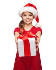 Sticker - smiling girl in santa helper hat with gift box