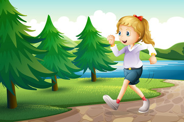 Wall Mural - A girl jogging near the pine trees at the riverbank