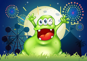 Wall Mural - A happy fat green monster at the amusement park