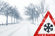 Snowy road with traffic sign