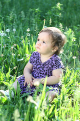 Girl  in a dandelion field