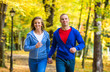 © Jacek Chabraszewski - Urban leisure - woman and man running in park