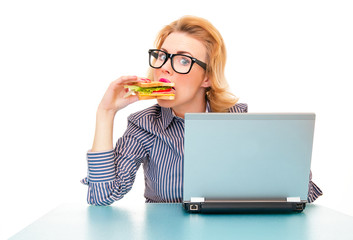 Wall Mural - Funny hungry business woman eating sandwich on work,