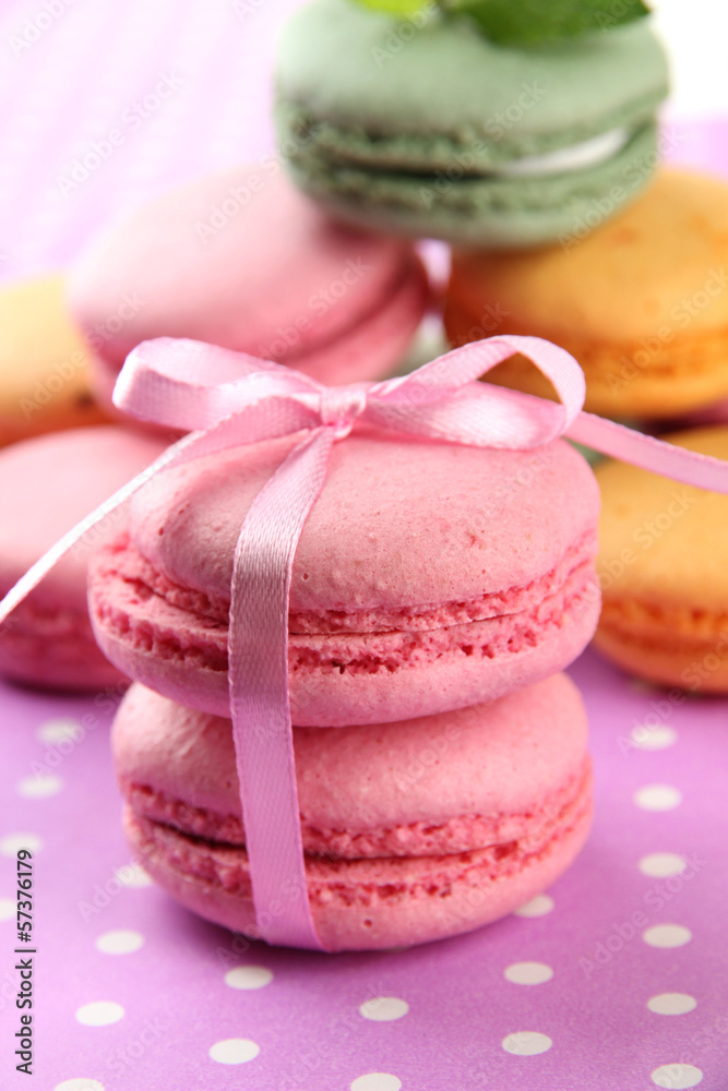 Gentle macaroons on table close-up