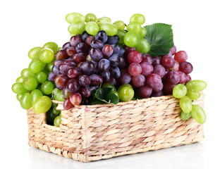 Sticker - Ripe green and purple grapes in basket isolated on white