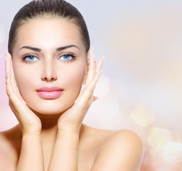 Wall Mural - beauty portrait. beautiful spa woman touching her face