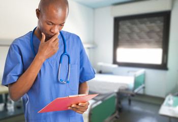 Poster - African doctor in a hospital room