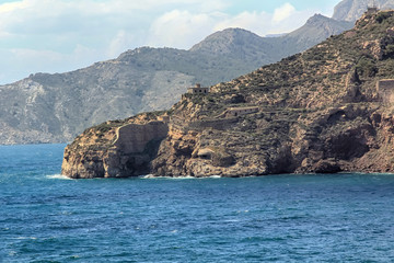 Wall Mural - coastal landscape with blue sea and beautiful cliffs