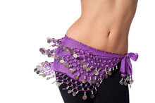 Belly Dancer Wearing A Purple Coin Belt And Shaking Her Hips