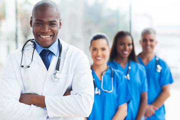 Wall Mural - african medical doctor and colleagues in hospital