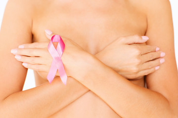 Wall Mural - naked woman with breast cancer awareness ribbon