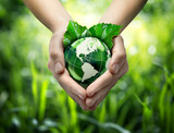 Green planet in your heart hands - usa - environment concept