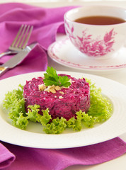 Wall Mural - A salad of beets and nuts. Selective focus.