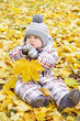 lovely baby with yellow leaf