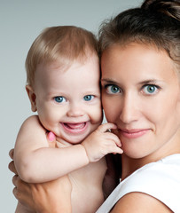happy mother with baby
