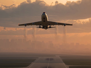 Wall Mural - airplane taking off at sunrise