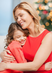 Canvas Print - hugging mother and daughter