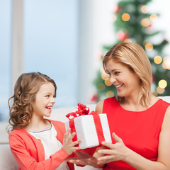 Sticker - happy mother and child girl with gift box