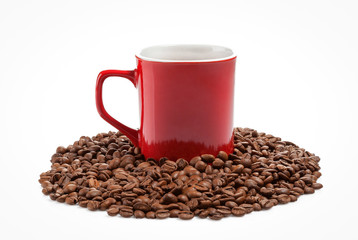 Red coffe cup into roasted coffee beans