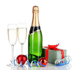 Bottle of champagne with glasses and Christmas balls isolated