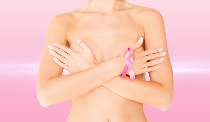 Wall Mural - naked woman with breast cancer awareness ribbon