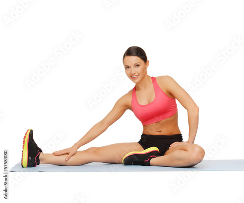 Foto-Stoff bedruckt - sporty woman doing exercise on the floor (von Syda Productions)