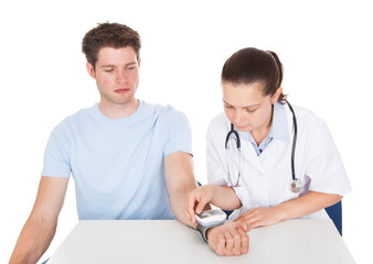 Wall Mural - Doctor Examining Patient