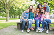 © WavebreakmediaMicro - Portrait of young college students in park