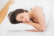 © lightwavemedia - Pretty young woman sleeping in bed