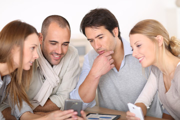 Aufkleber - Business meeting around table with electronic devices