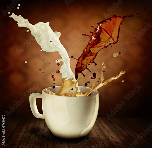 Nowoczesny obraz na płótnie Coffee With Milk Splashing. Cup of Cappuccino or Latte