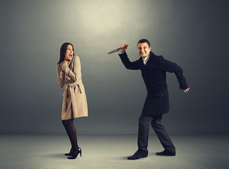 Canvas Print - woman and man with knife