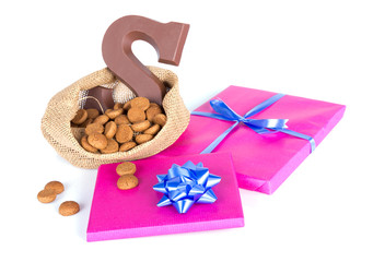 Wall Mural - Jute bag with chocolate, ginger nuts and presents