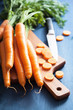 fresh carrot on cutting board