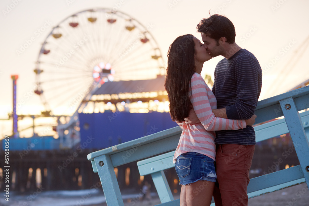 romantic couple kissing at sunset i Stock Photo | Adobe Stock