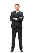 Full-length Portrait Of Business Man With Hands Crossed