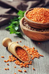 Wall Mural - Lentils in wooden bowl