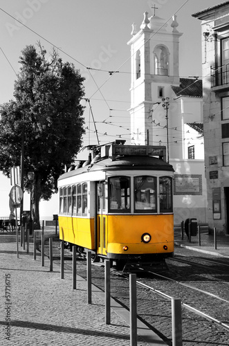 Naklejka na szybę Lisbon old yellow tram over black and white background