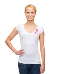 Wall Mural - woman in blank t-shirt with pink cancer ribbon