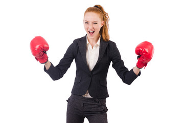 Woman businesswoman with boxing gloves on white