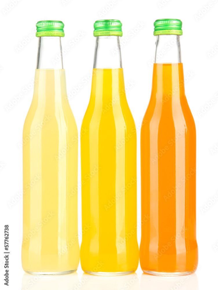 Bottles with tasty drink, isolated on white
