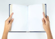 © Africa Studio - Book in hands isolated on white