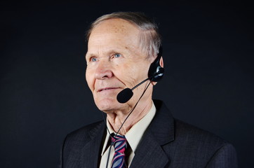 senior businessman with headset