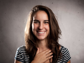 Wall Mural - happy young woman smiling