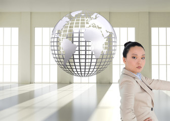 Aufkleber - Composite image of unsmiling asian businesswoman pointing