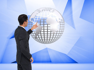 Aufkleber - Composite image of unsmiling asian businessman pointing